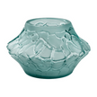 A decorative cristal terramineral turquoise luxury glass vase with a textured, cracked surface and a flared shape, styled elegantly for modern decor.