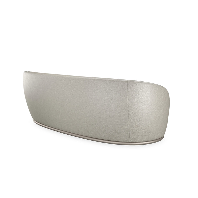 Caracole Nebula Sofa UPH-025V-116-B, upholstered back and curved base — manufacturer photograph