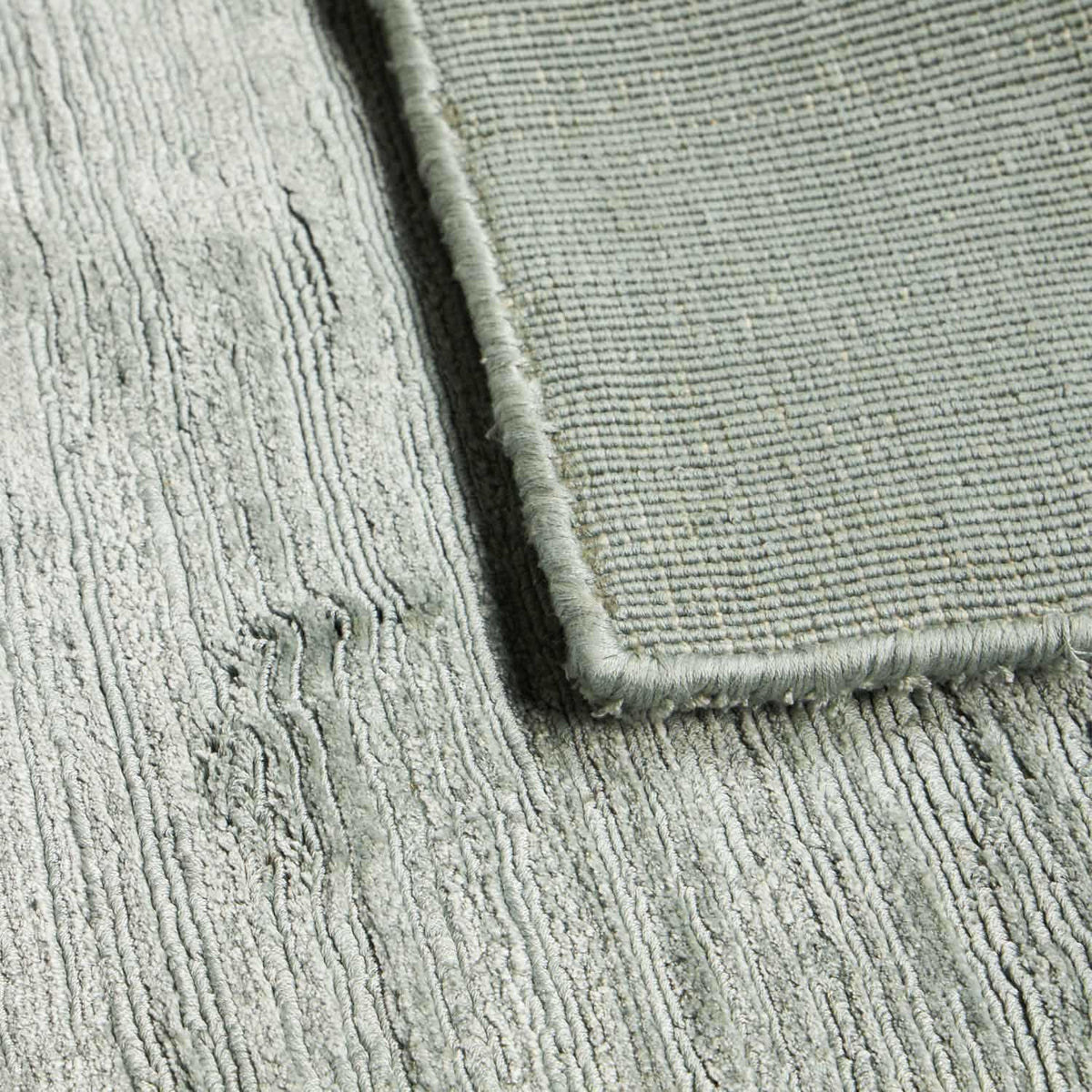 Halston Textured Lyocell Striped Area Rug