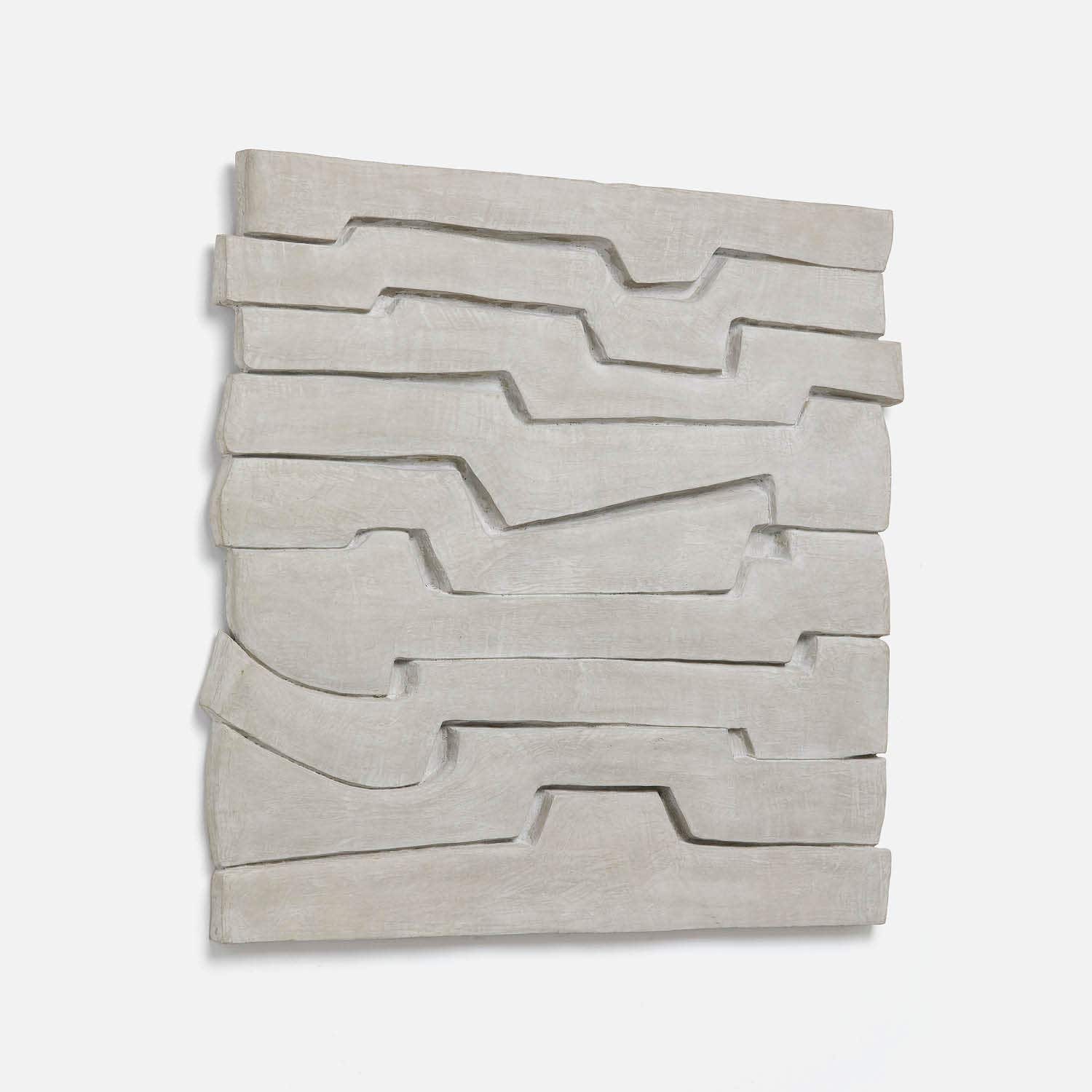 Gray abstract wall art featuring layered, wavy forms creating an intriguing, textured design.