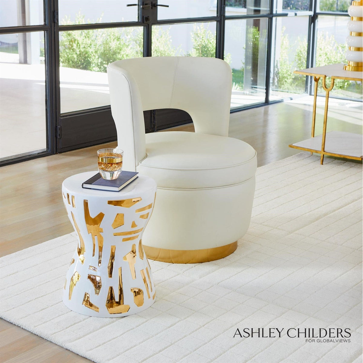 Global Views Milk Leather Stella Swivel Chair by Ashley Childers