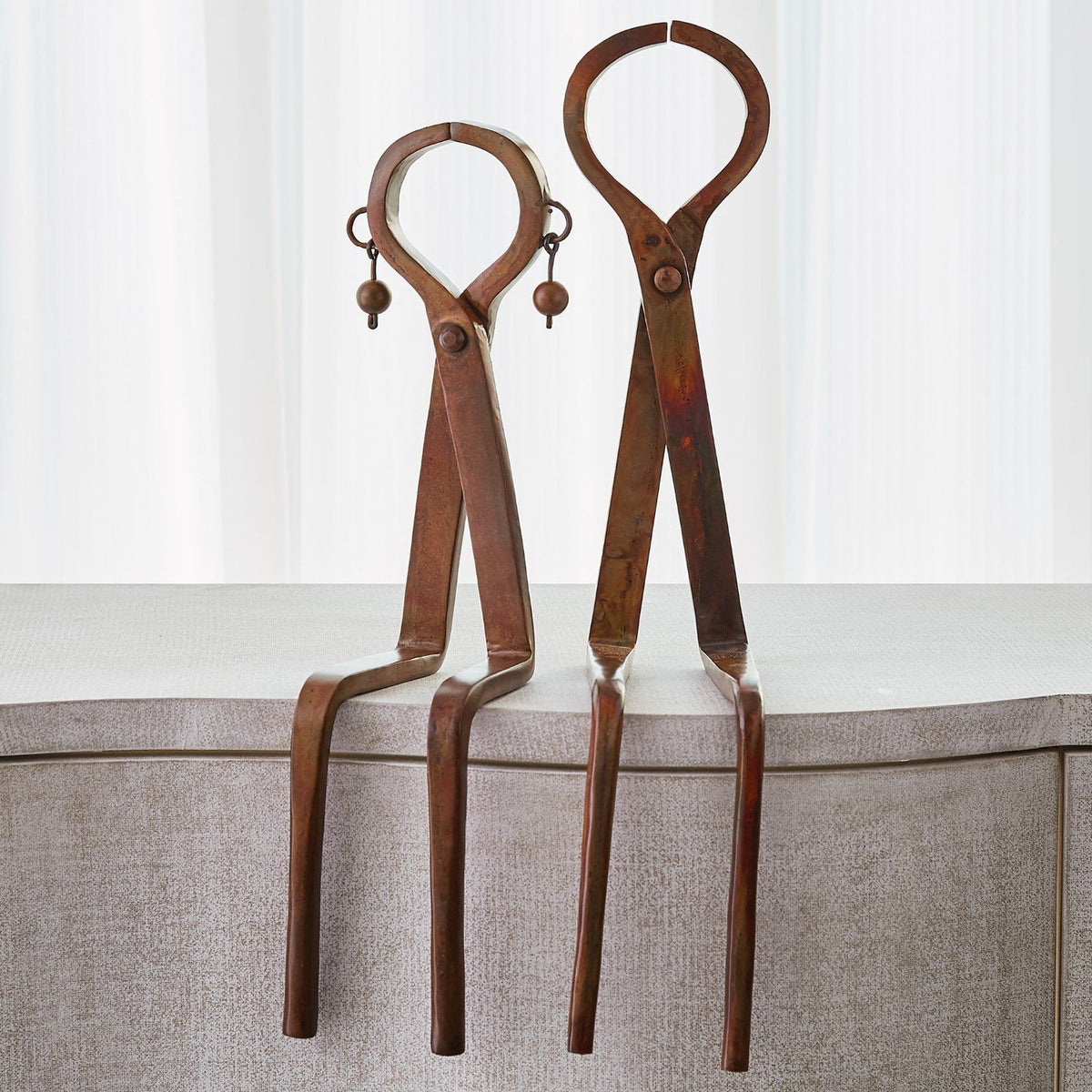 Global Views Iron Sitting Couple Sculpture
